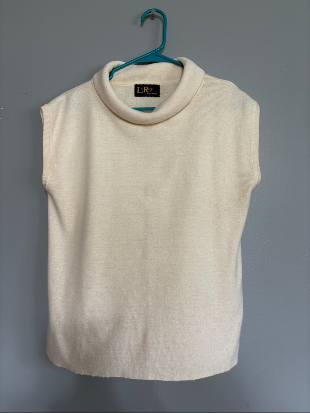 LeRoy Cream Sleeveless Turtleneck Sweater